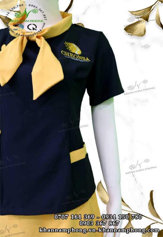 Đồng phục spa Cheonsa Beauty & Clinic màu đen & vàng với chất liệu cotton