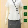 Đồng Phục Spa Màu Trắng Gạo Chất Liệu Cotton Nhật Thêu Logo Hoàng Trầm Massage