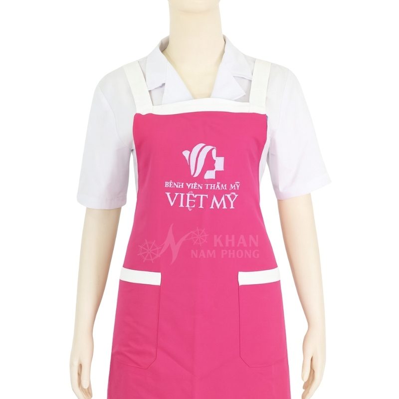 Tạp Dề Thẩm Mỹ Màu Hồng Phối Trắng Cotton Lạnh Dáng Suông Freesize Thêu Logo Việt Mỹ