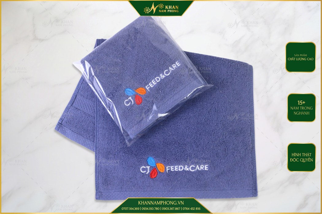 Khăn quà tặng 20/10 cho công nhân, nhân viên 28x50cm chất liệu cotton cao cấp màu xanh navy thêu logo CJ Feed & Care đóng túi OPP