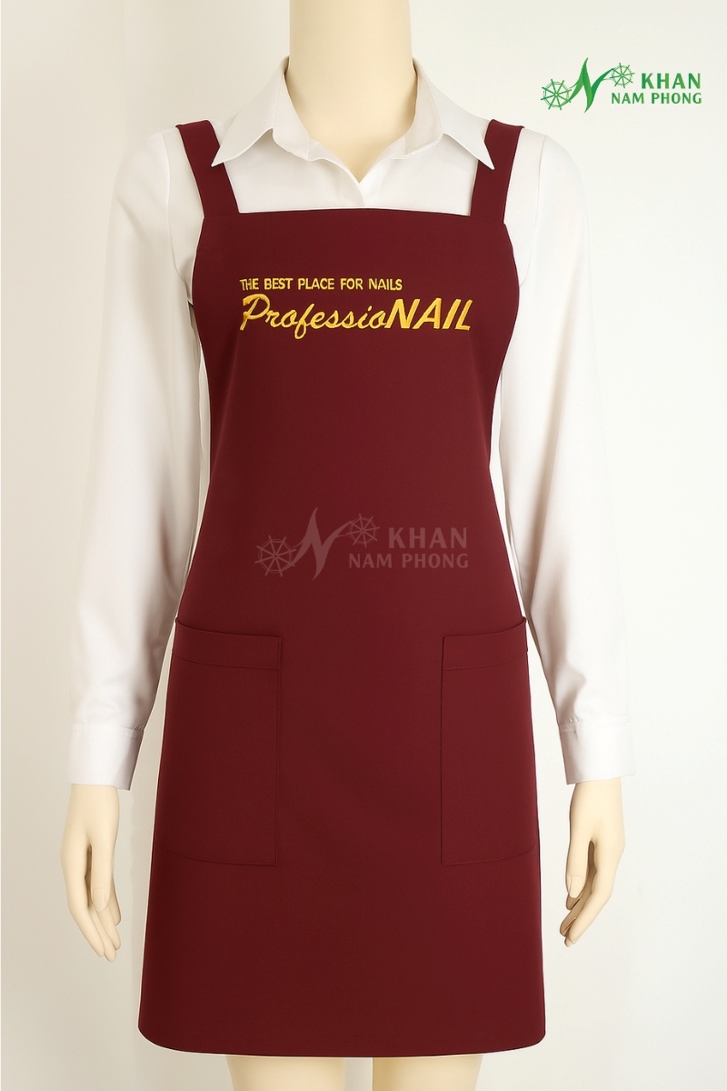 Tạp dề nail cổ vuông màu đỏ đô cotton lạnh thêu logo Professionail freesize