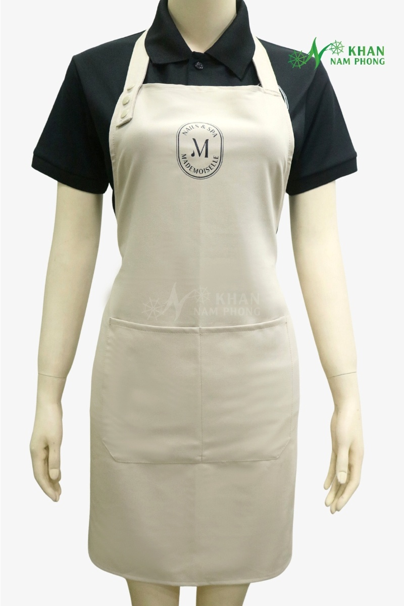 Tạp dề nail kem nhạt cotton lạnh thêu logo Mademoiselle freesize