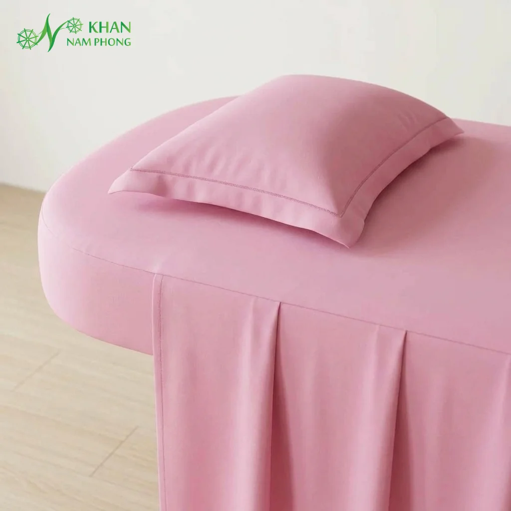 Cận cảnh chất liệu thun Hàn Quốc co giãn 4 chiều màu hồng cánh sen và gối nằm spa