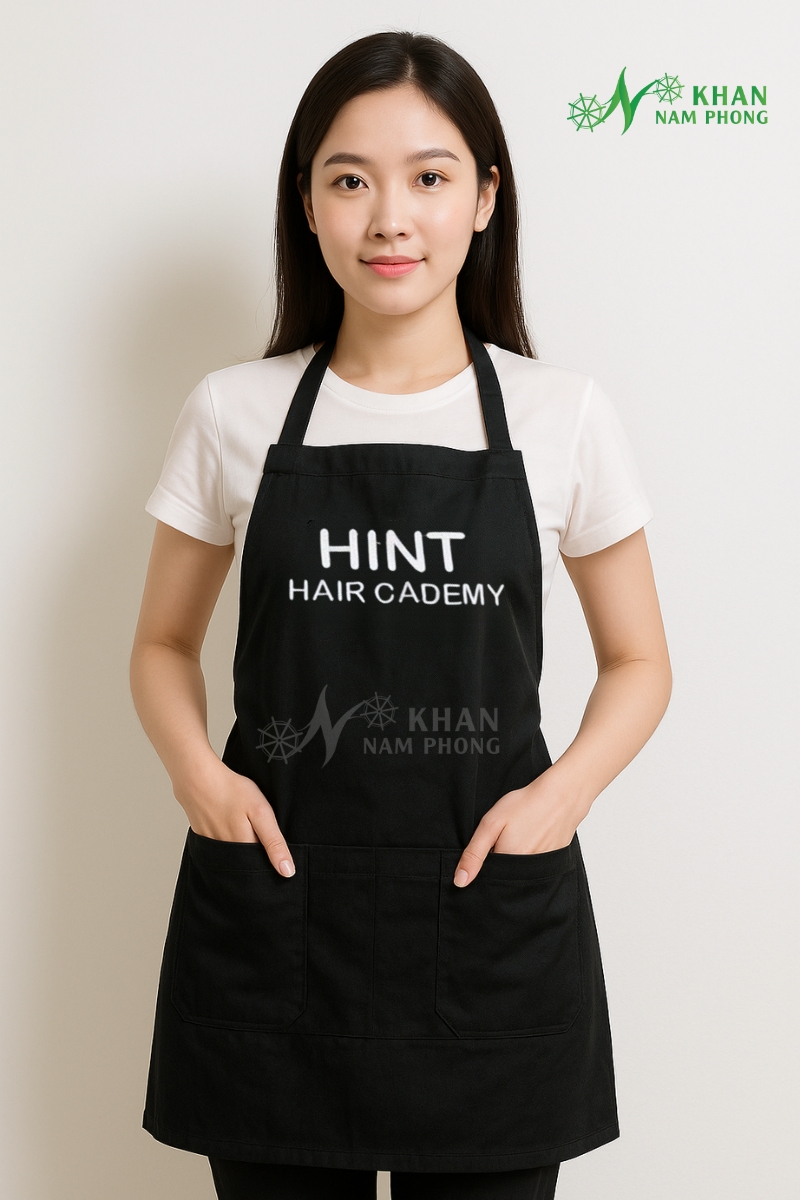 Tạp Dề Tiệm Cắt Tóc Màu Đen Cotton Lạnh Freesize Thêu Logo Hint Hair Cademy Tạp Dề Tiệm Cắt Tóc Màu Đen Cotton Lạnh Freesize Thêu Logo HINT HAIR CADEMY