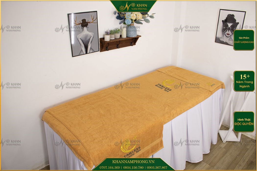 Bộ Khăn Trải Giường Spa 100% Cotton Thêu Logo Màu Vàng Bộ khăn trải giường spa 100% cotton thêu logo màu vàng