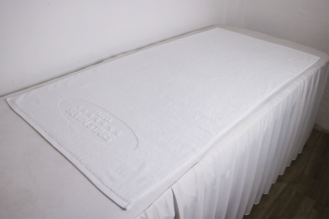 Khăn Trải Giường Spa Đà Nẵng, Chất Liệu Cotton, Dập Nổi Logo Khăn trải giường spa Đà Nẵng, chất liệu cotton, dập nổi logo
