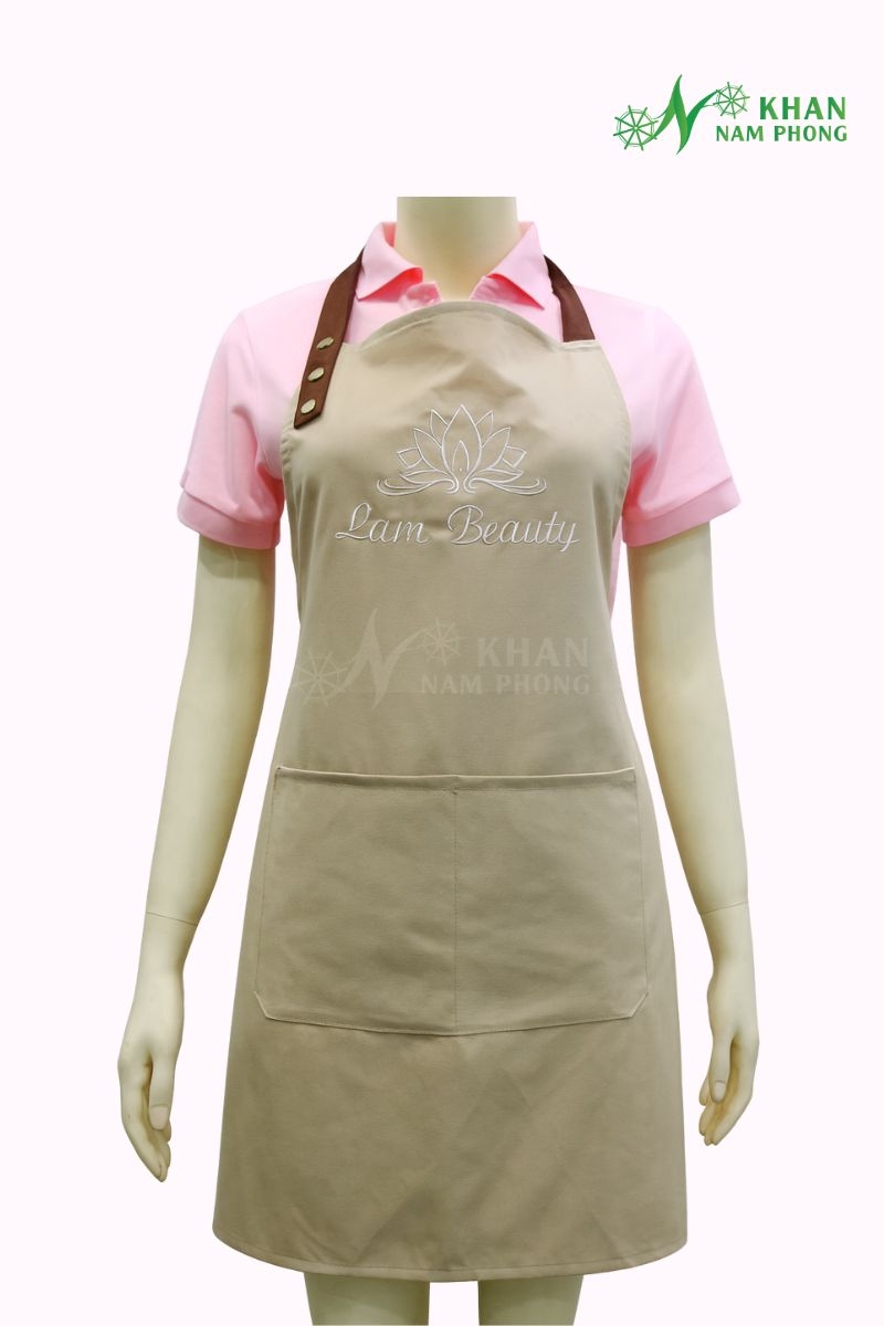 Tạp Dề Làm Nail, Làm Tóc Thêu Logo Cotton Lạnh, Đứng Form, Không Xù Lông Tạp Dề Làm Nail, Làm Tóc Thêu Logo Cotton Lạnh, Đứng Form, Không Xù Lông