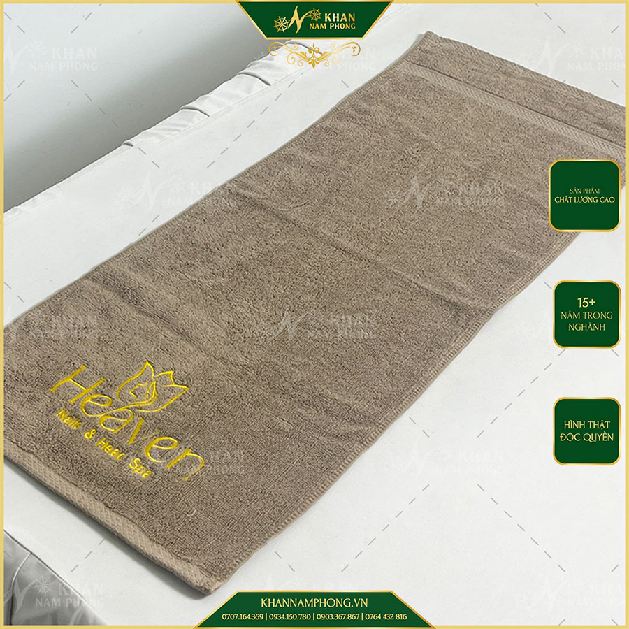Khăn Làm Nail Cotton 34X80 Cm Thêu Logo Heaven Màu Nâu Tây Khăn Làm Nail Cotton 34X80 cm Thêu Logo Heaven Màu Nâu Tây